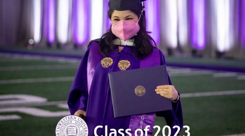 Asian-Hispanic looking woman who is in a purple graduation gown, black cap, and hot pink N95 mask. She stands with a purple diploma in one hand and a cane in the other. The background is a grassy football field and purple and white curtains. Caption says, "Class of 2023" with a purple and white seal on the bottom of the picture.